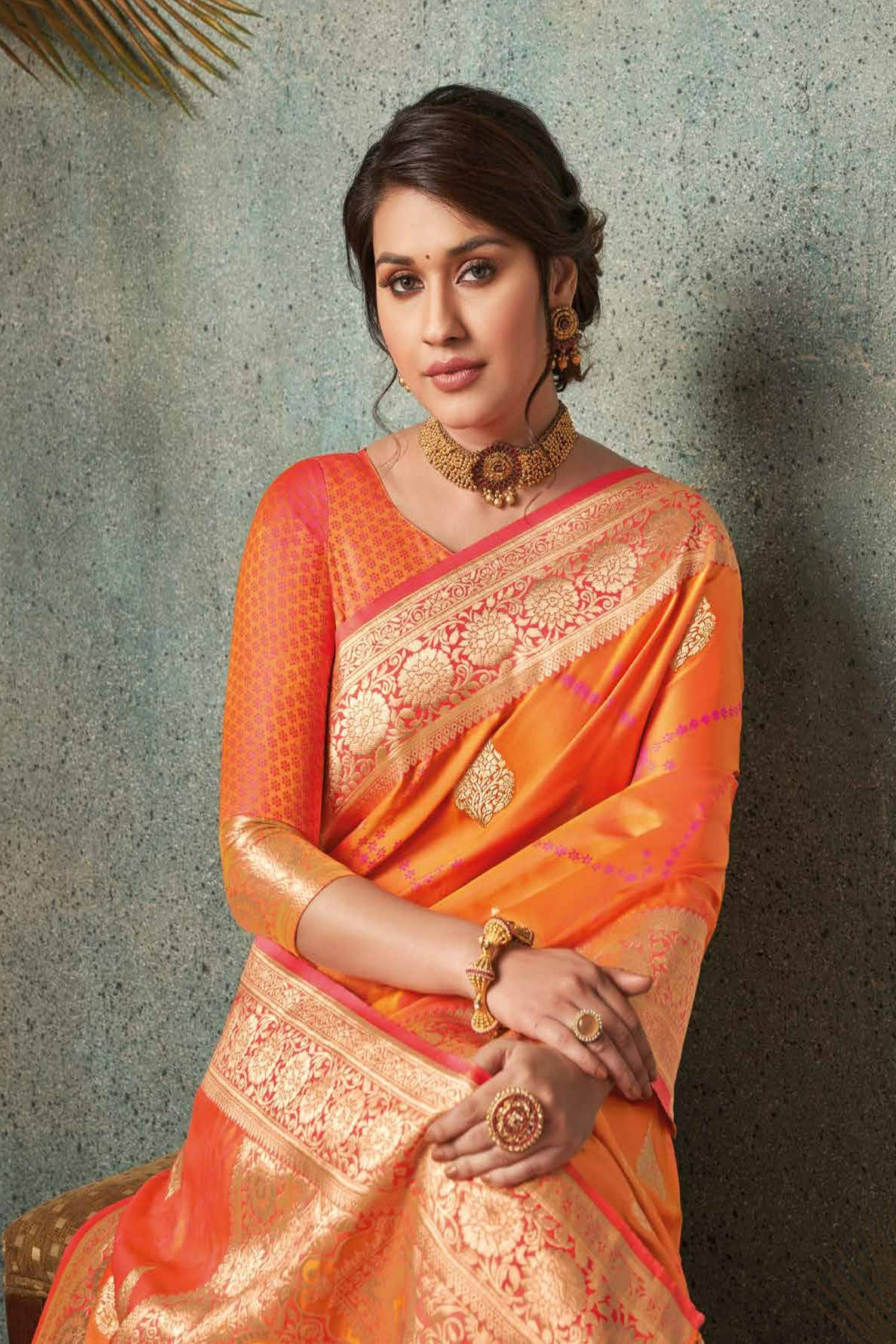 Orange Saree With Intricate Gold Zari