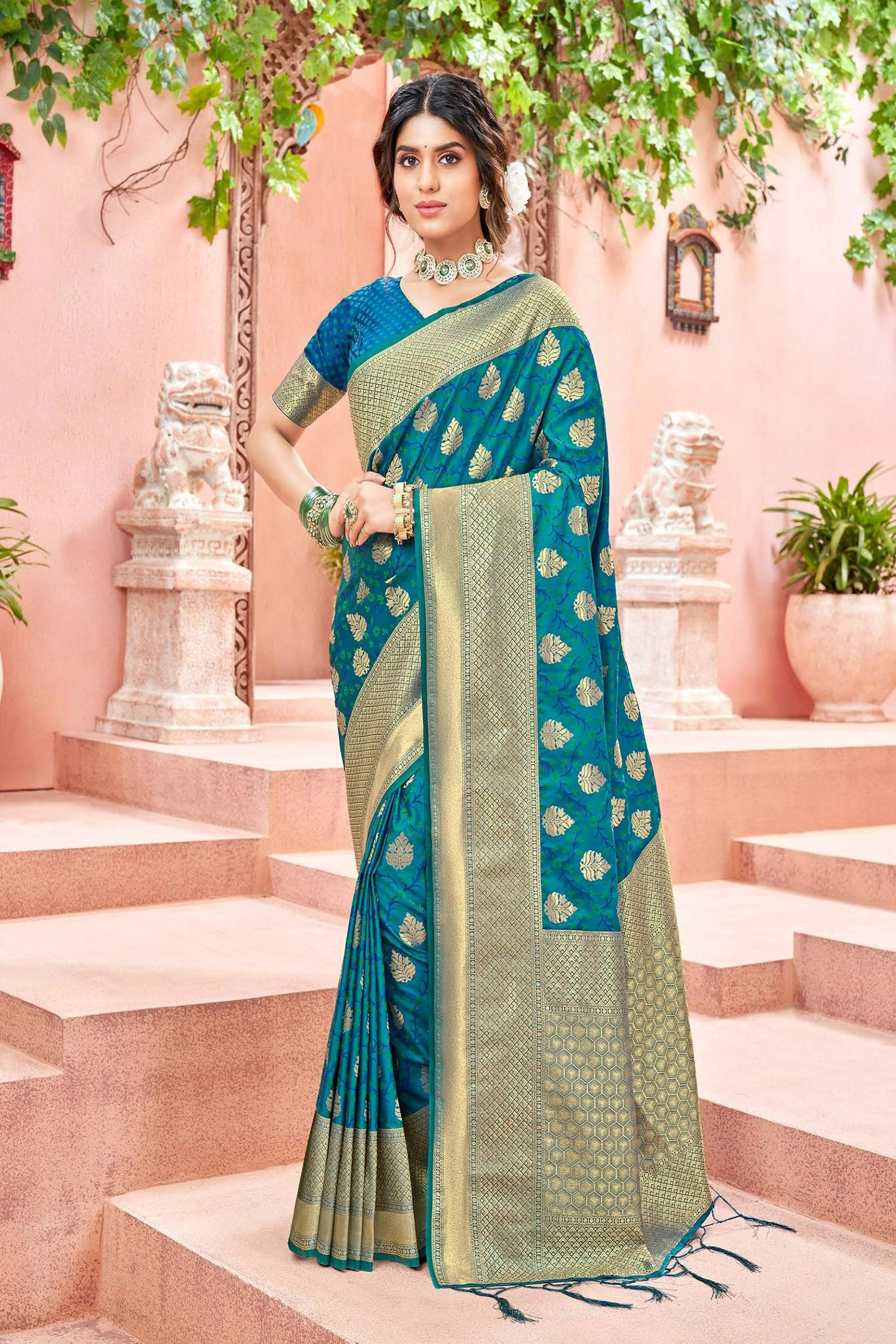 Spellbinding Blue Satin Saree With Gold Zari