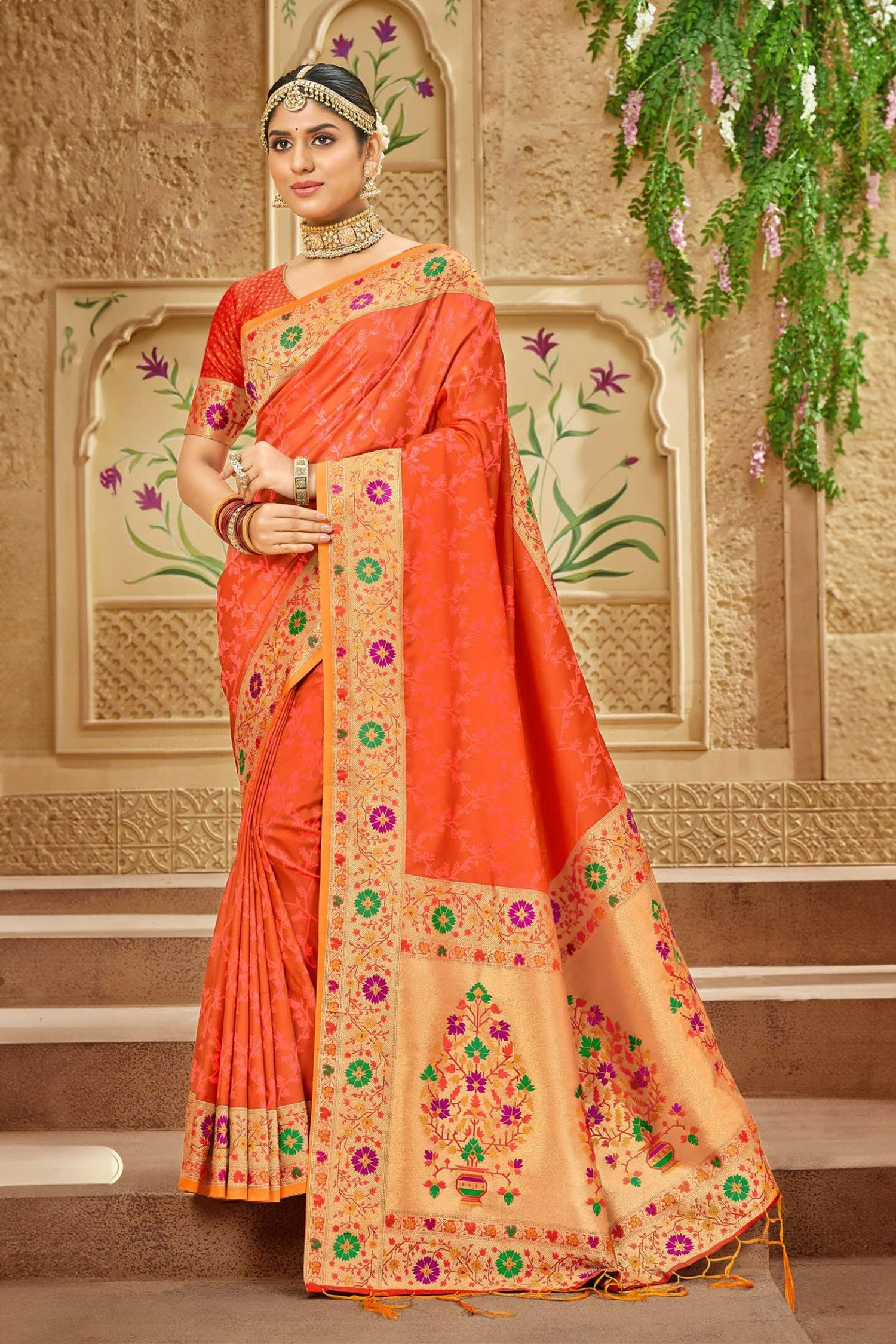 Orange Satin Saree With Green And Purple Meenakari