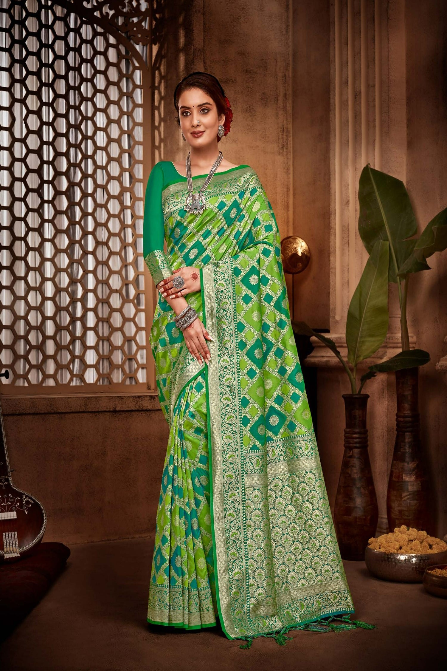 Stunning Green Saree With Light Gold Zari