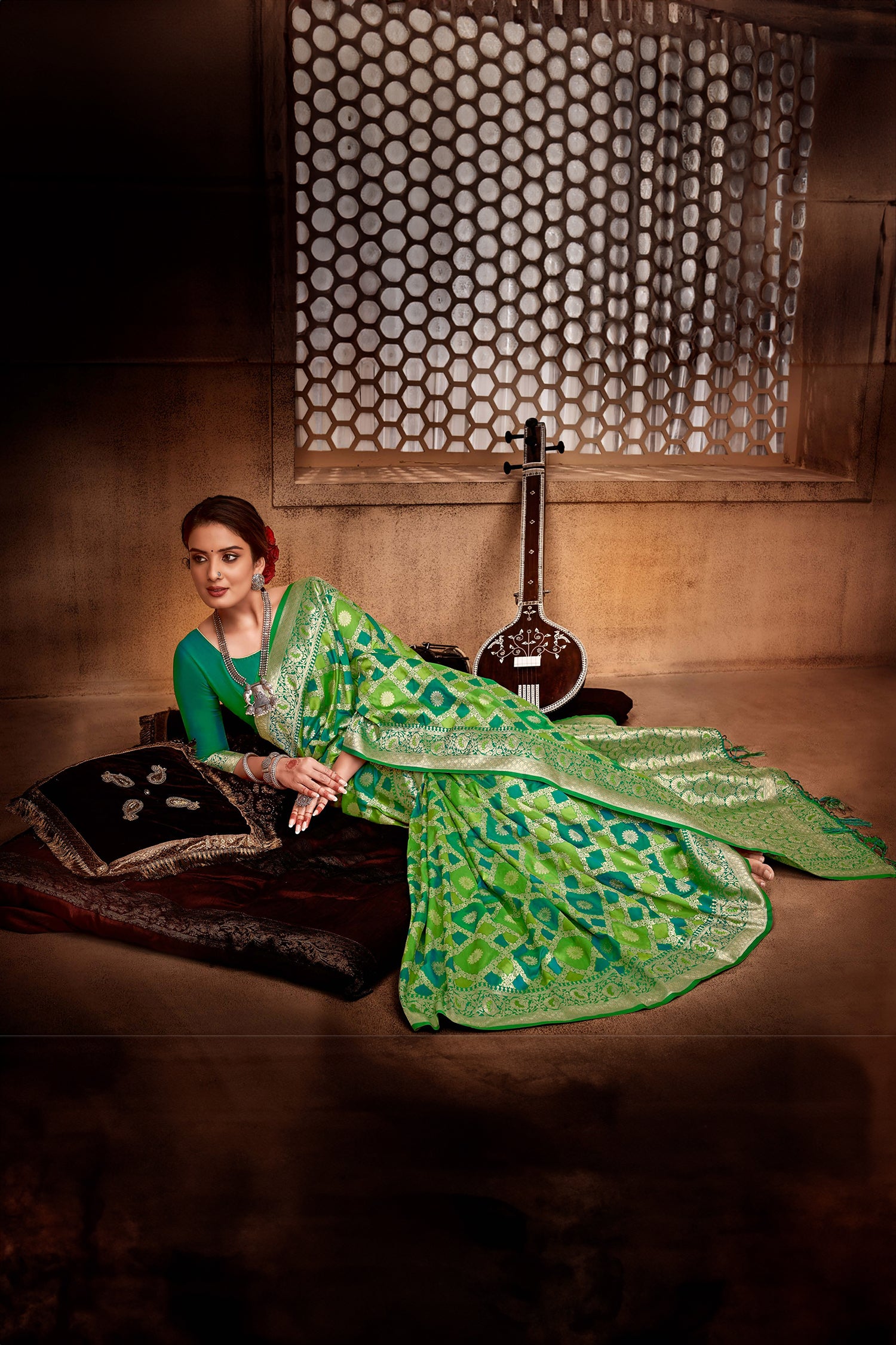 Stunning Green Saree With Light Gold Zari