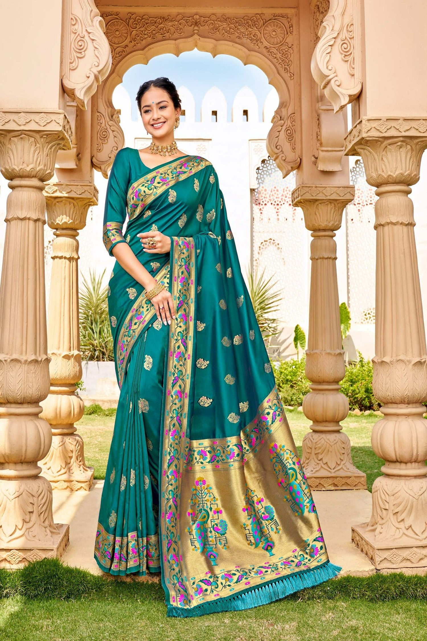 Teal Paithani Saree With Floral And Peacocok Patterns