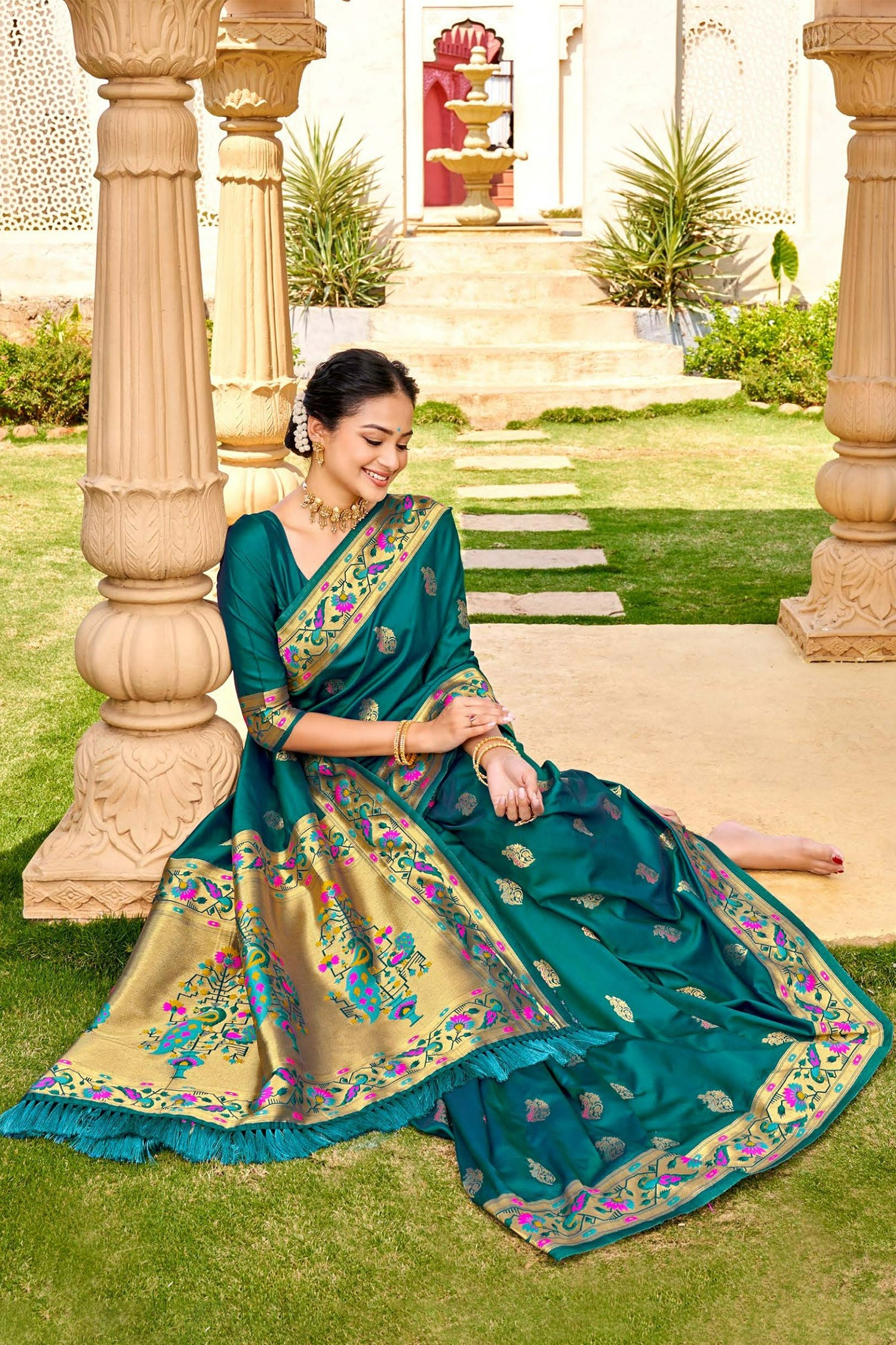 Teal Paithani Saree With Floral And Peacocok Patterns