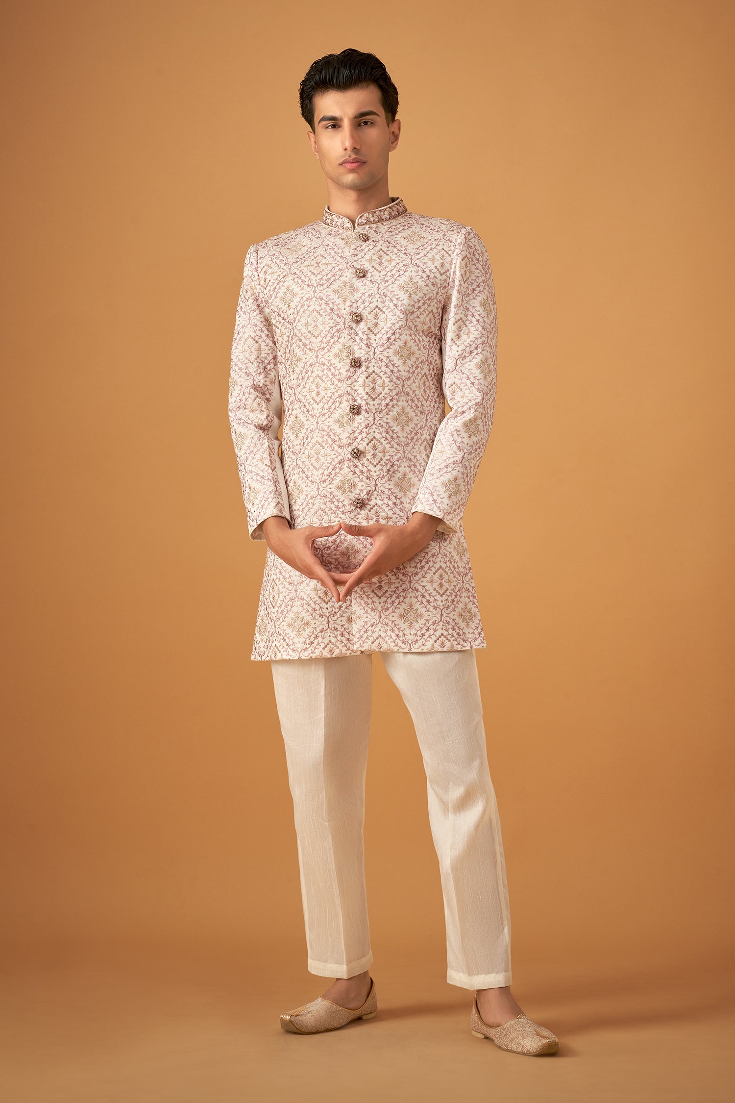 Ivory White Sherwani With Intricate Embroidery Work And Decorative Buttons