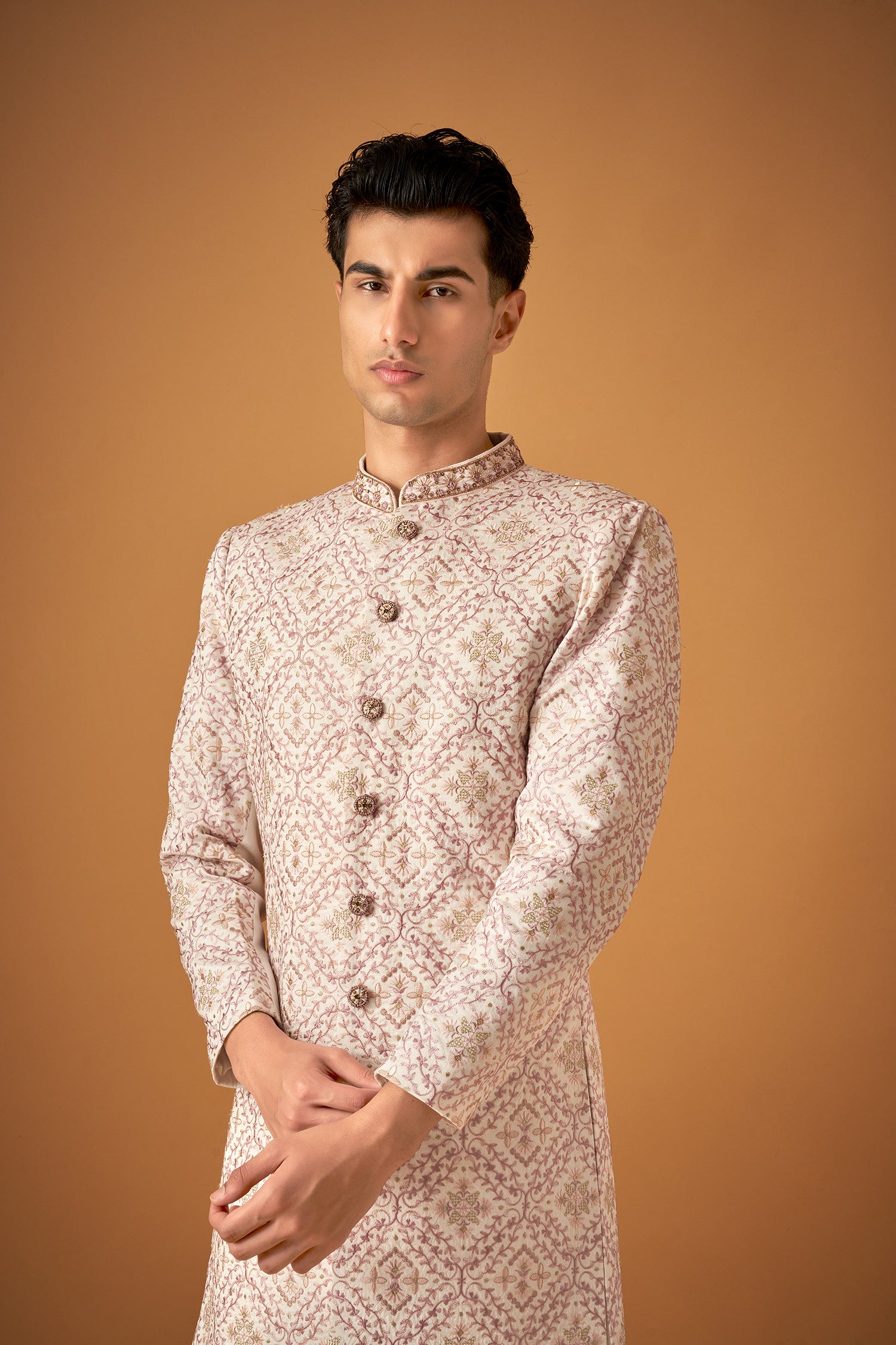 Ivory White Sherwani With Intricate Embroidery Work And Decorative Buttons