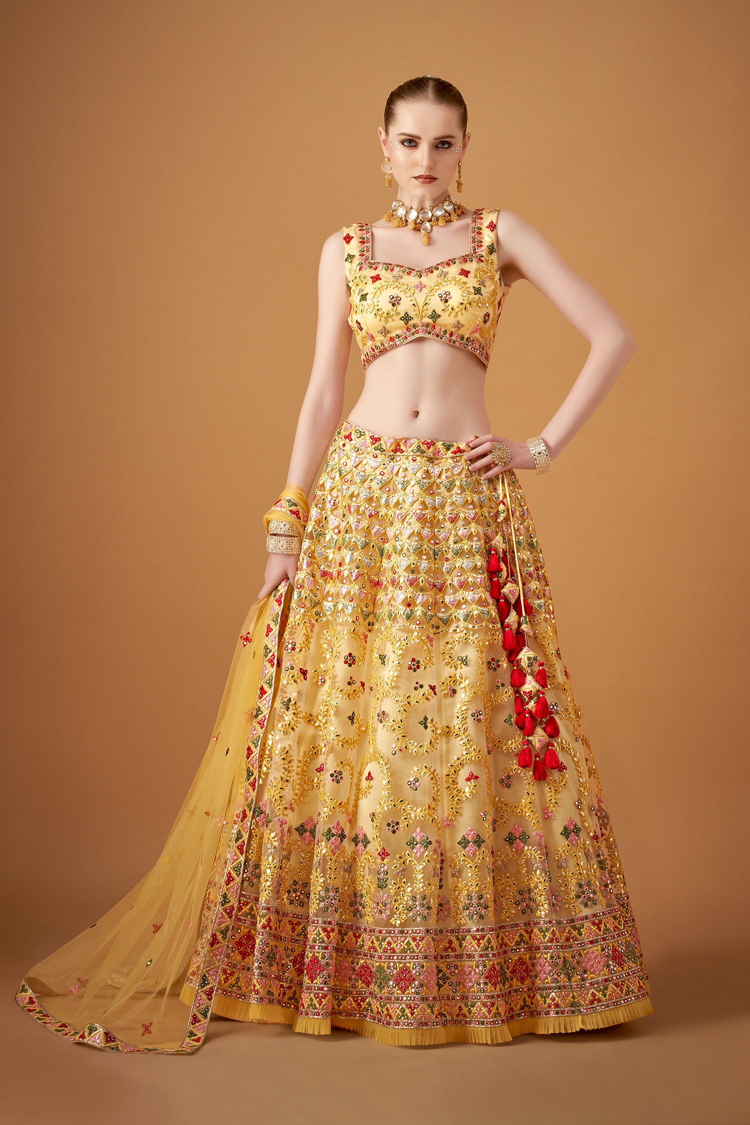 Glamorous Yellow Lehenga Set With Silver Foil Embellishments