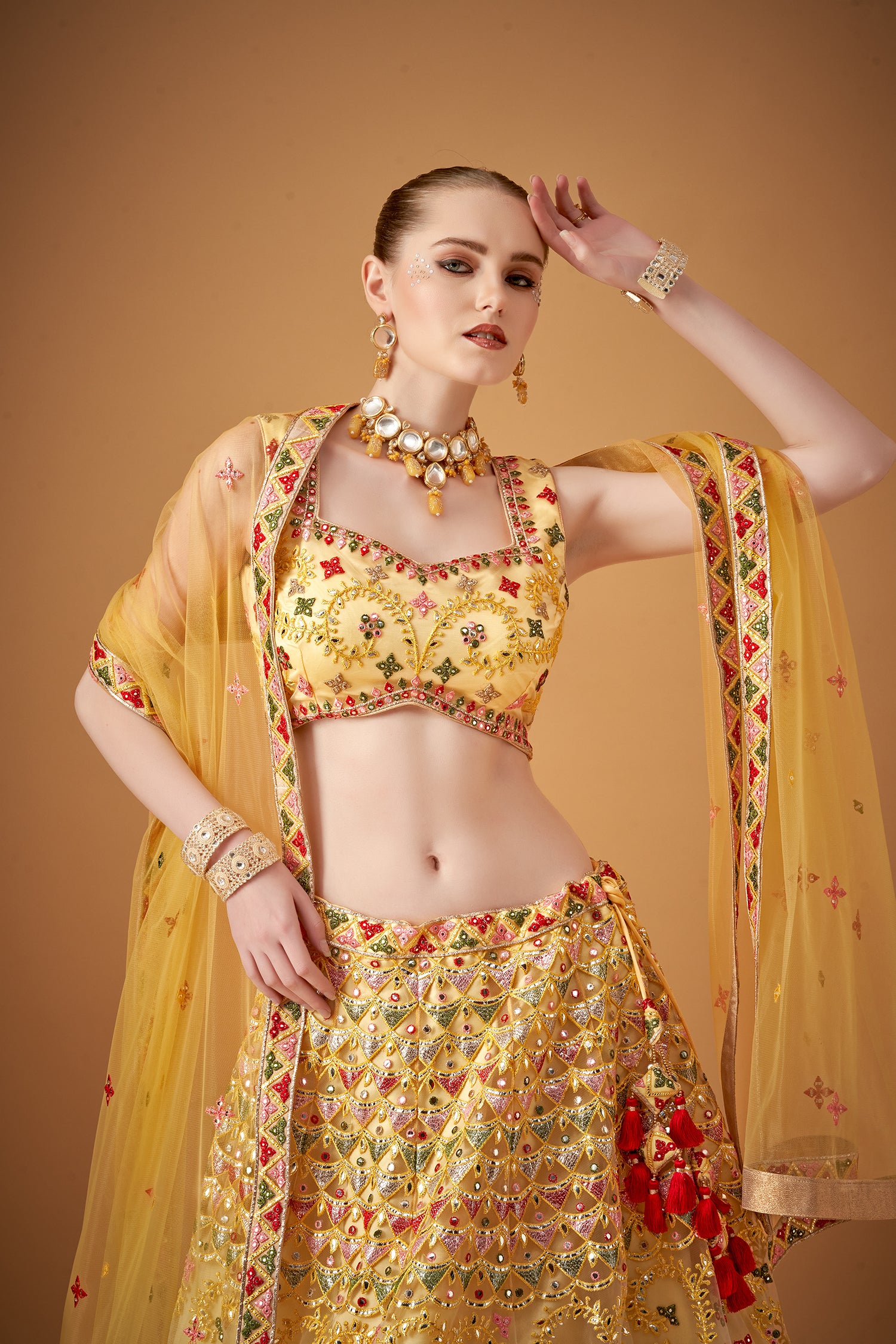 Glamorous Yellow Lehenga Set With Silver Foil Embellishments