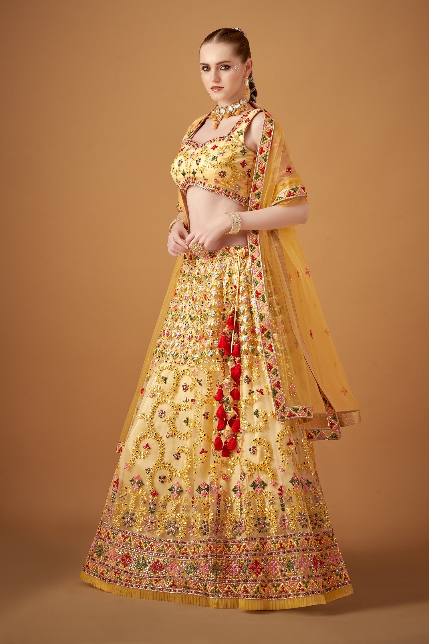 Glamorous Yellow Lehenga Set With Silver Foil Embellishments