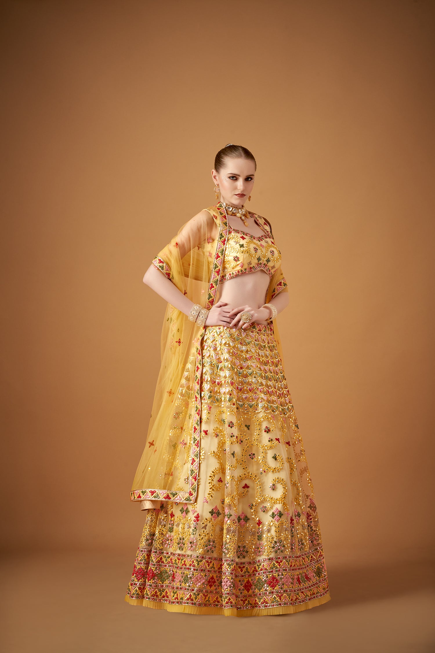 Glamorous Yellow Lehenga Set With Silver Foil Embellishments