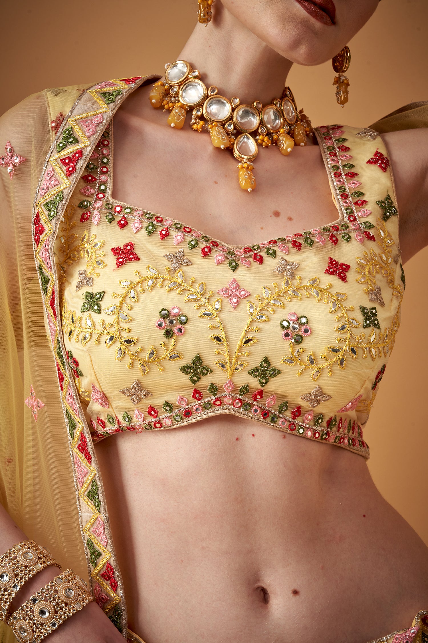 Glamorous Yellow Lehenga Set With Silver Foil Embellishments