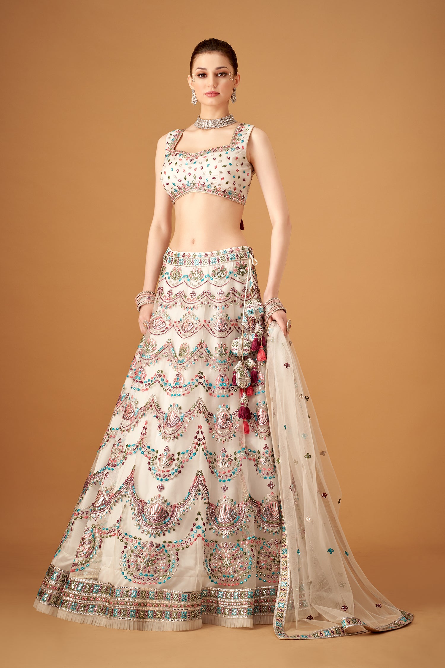 White Lehenga Set With Multicolor Embroidery And Silver Foil Embellishments