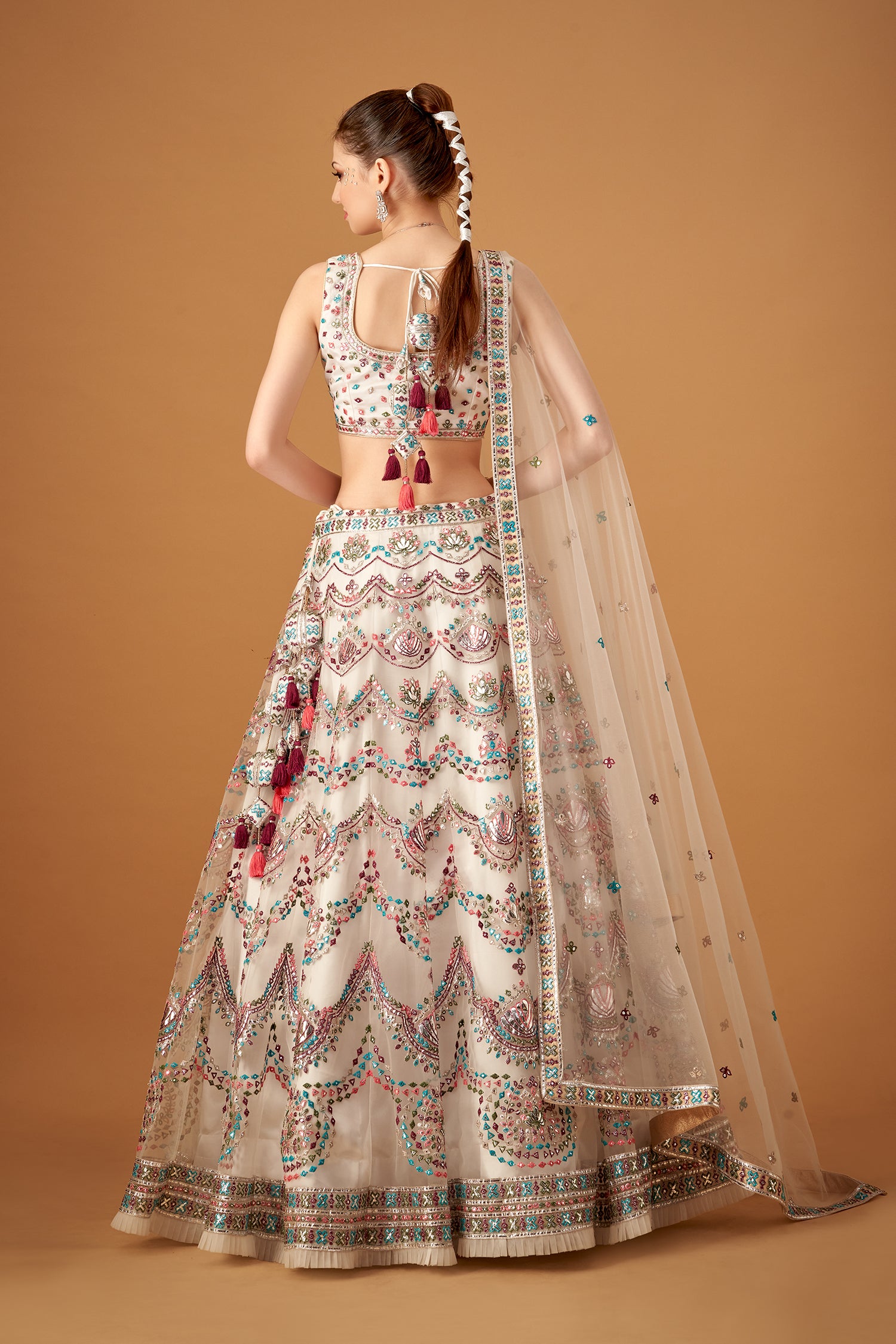 White Lehenga Set With Multicolor Embroidery And Silver Foil Embellishments