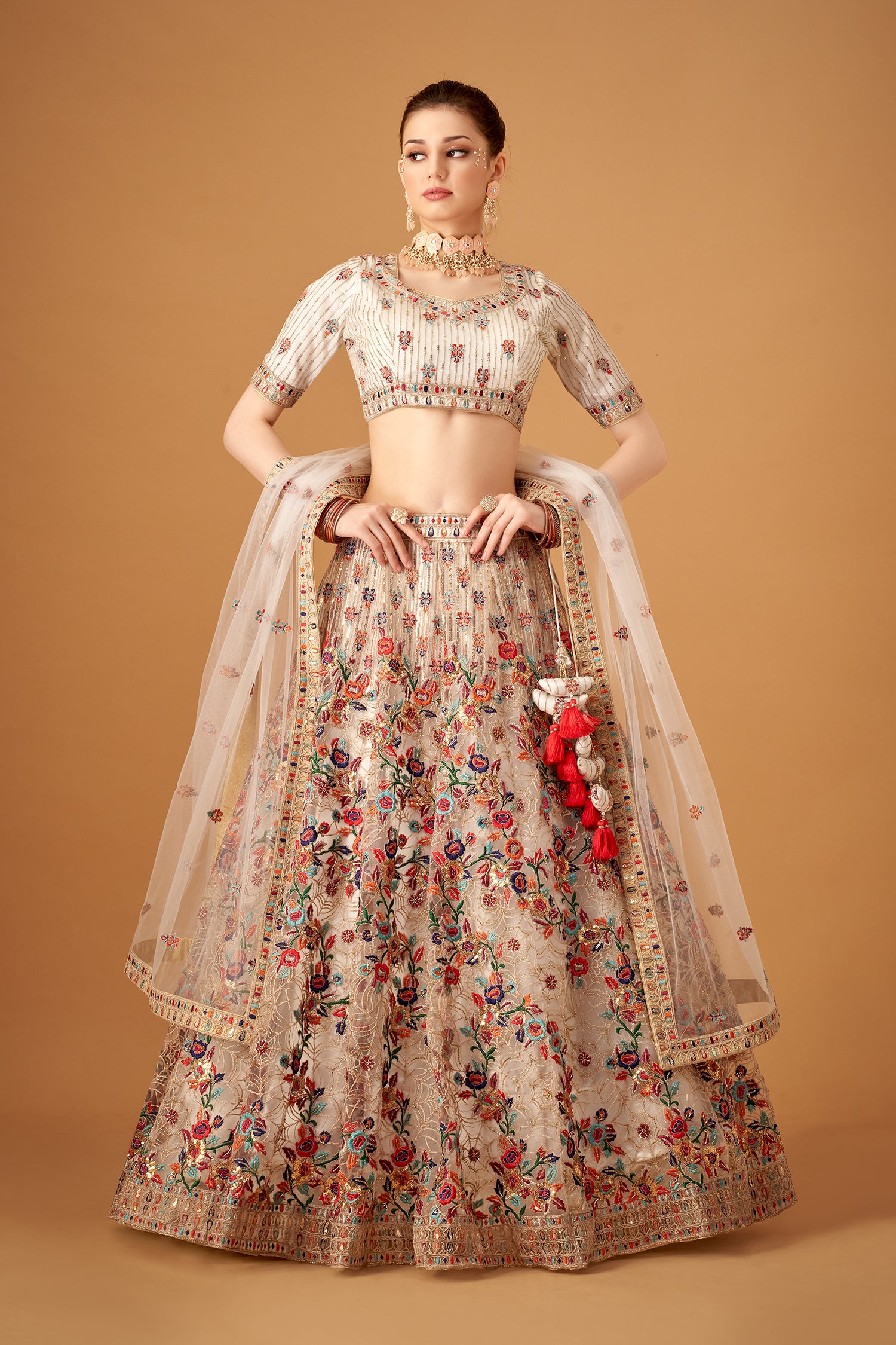 White Hand Embroidered Lehenga With Floral Patterns
