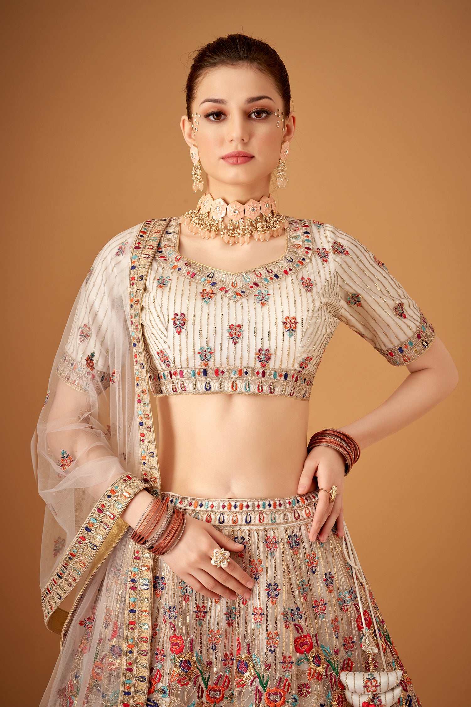 White Hand Embroidered Lehenga With Floral Patterns