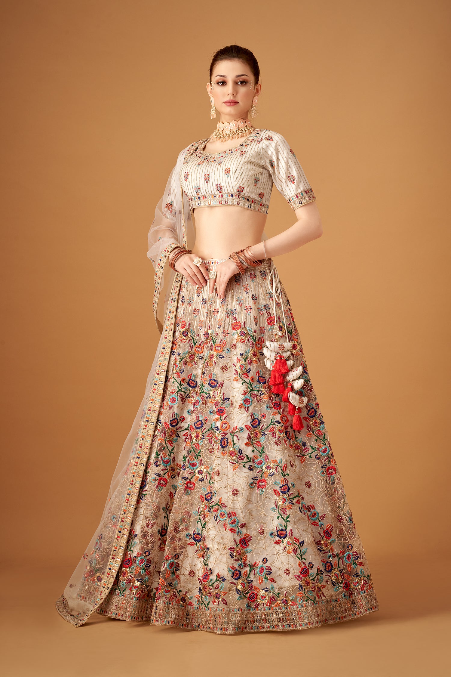 White Hand Embroidered Lehenga With Floral Patterns