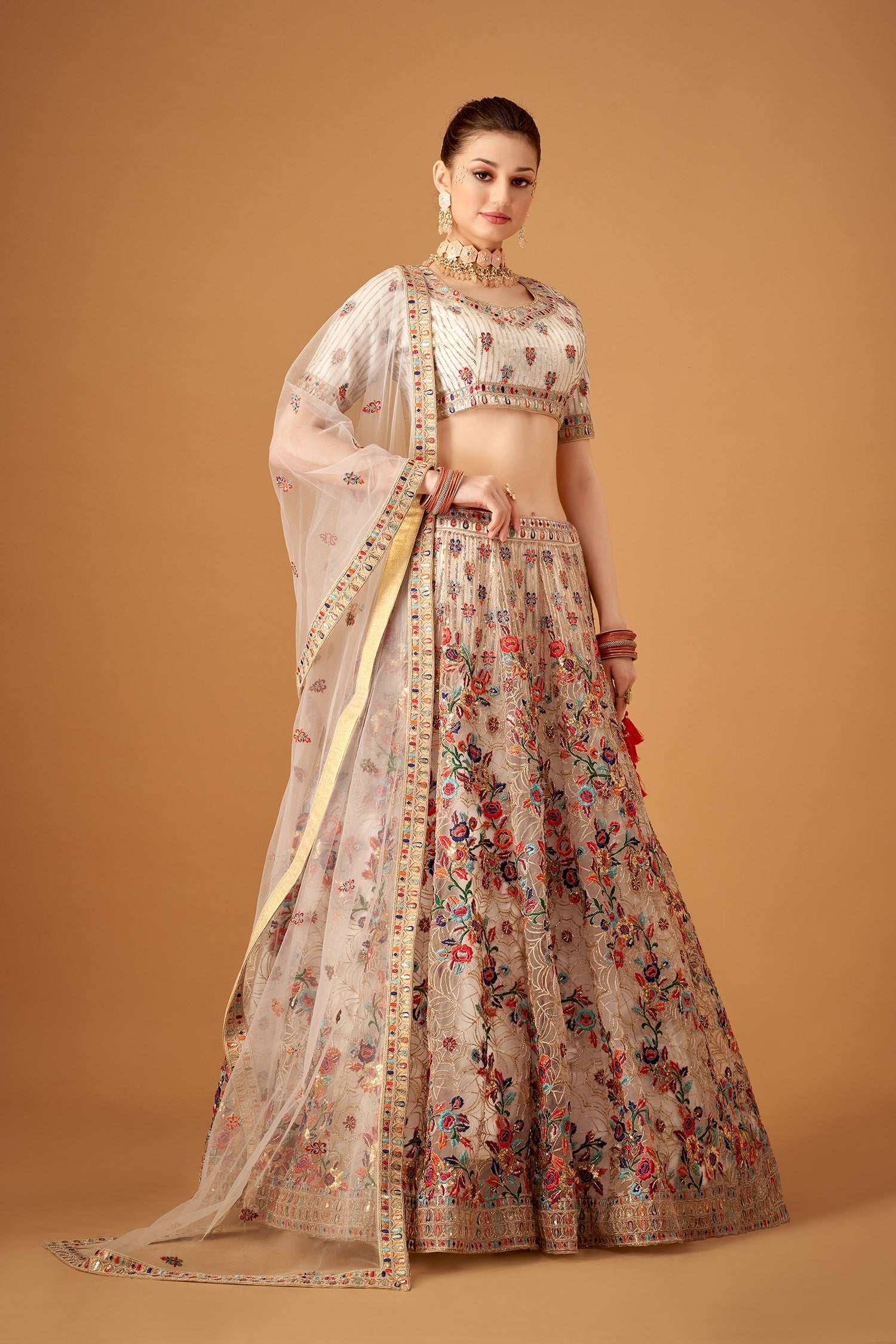 White Hand Embroidered Lehenga With Floral Patterns