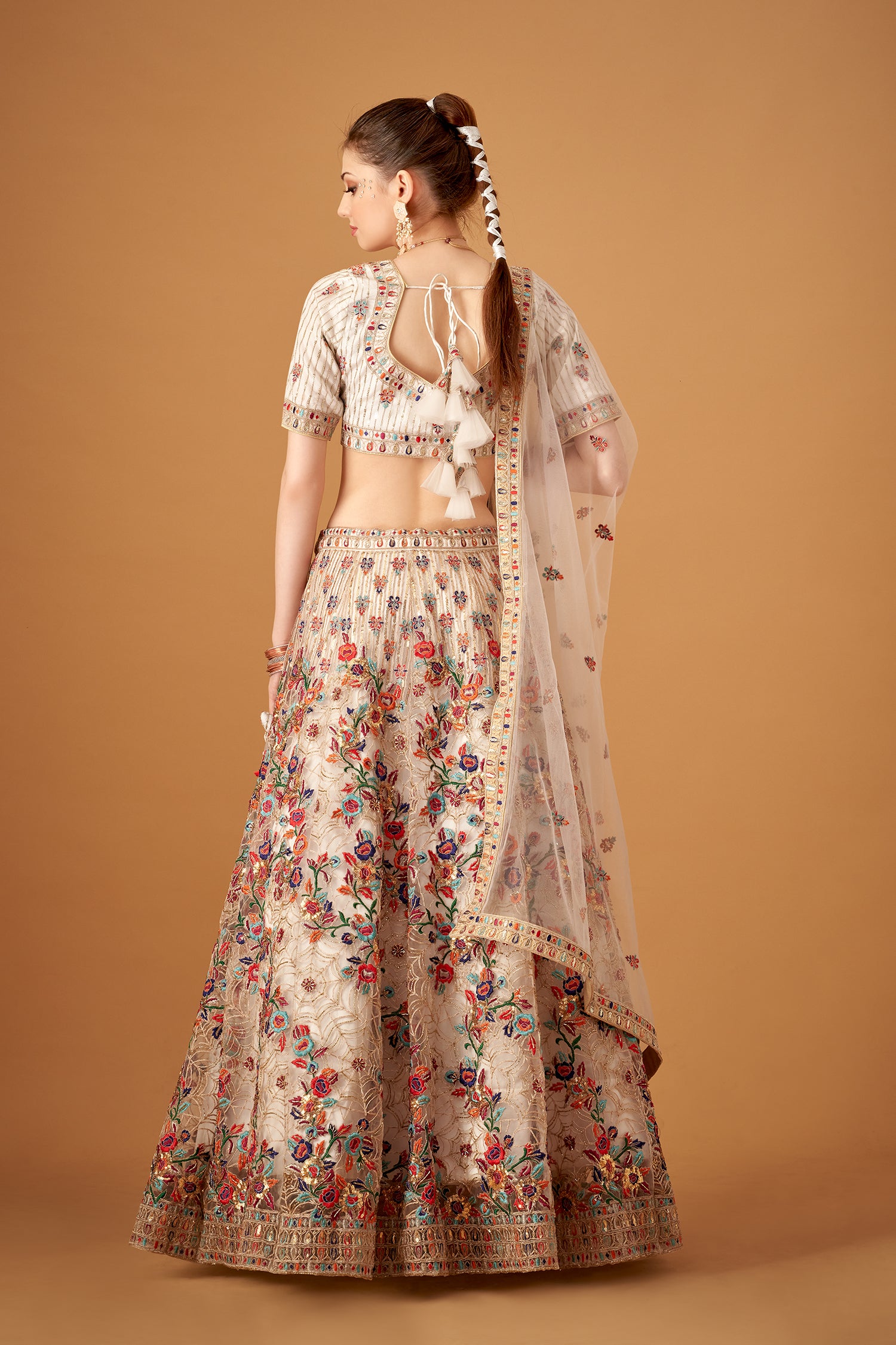 White Hand Embroidered Lehenga With Floral Patterns