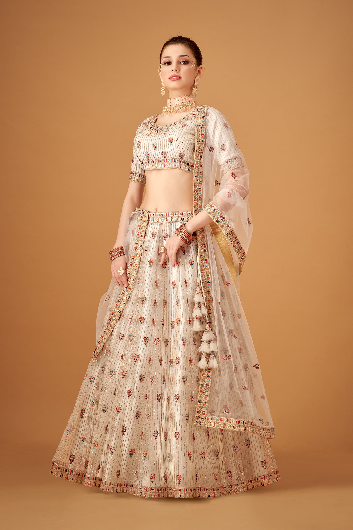 White Embroidered Lehenga And Blouse Set