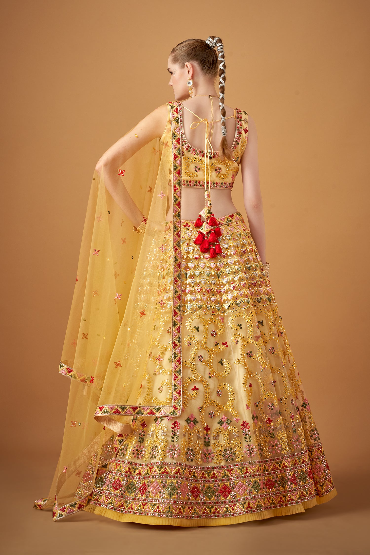 Glamorous Yellow Lehenga Set With Silver Foil Embellishments